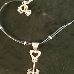 925 large key pendant and black leather necklace.